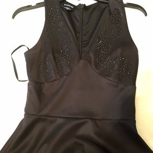 BEBE PEPLUM TOP